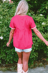 Bluse mit geometrisch bestickten Quasten in Erdbeerrosa
